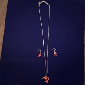 Necklace: Orange fish pendant on silver chain
